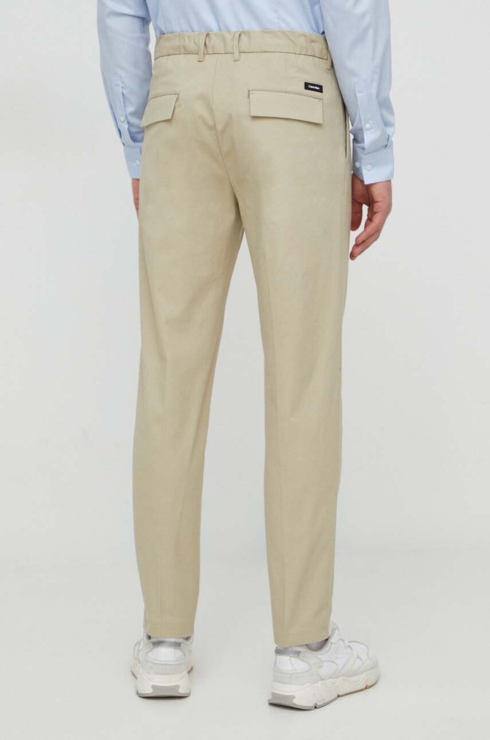 Odzież Calvin Klein spodnie K10K111490 beżowy