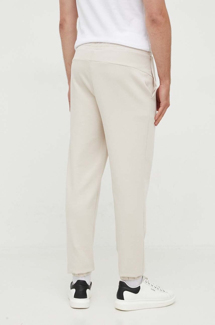 Odzież Calvin Klein spodnie dresowe K10K111566 beżowy