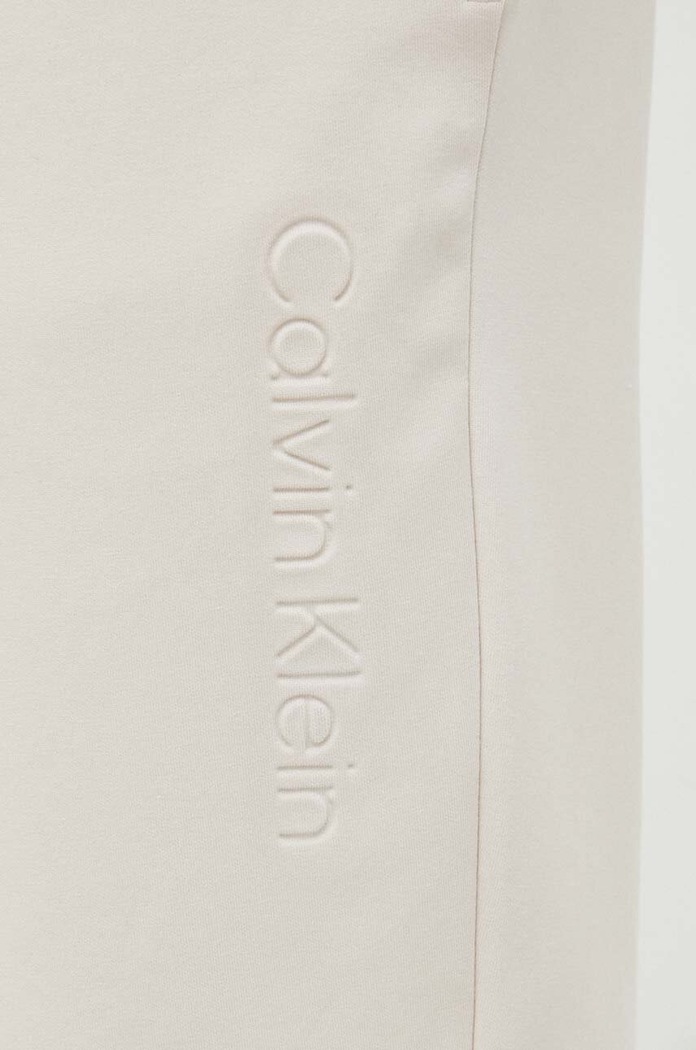 Calvin Klein spodnie dresowe beżowy K10K111566