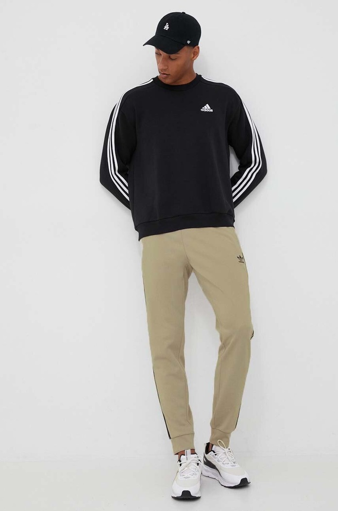 Tepláky adidas Originals IM4544 béžová AW23
