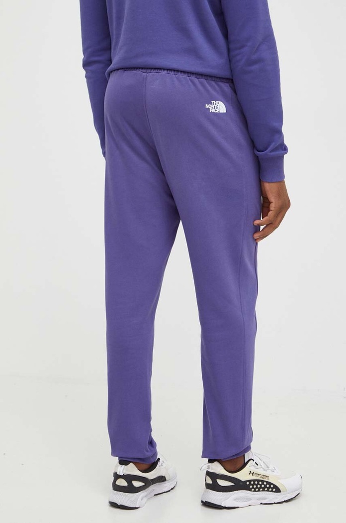 Odzież The North Face spodnie dresowe bawełniane NF0A4M7LI0D1 fioletowy