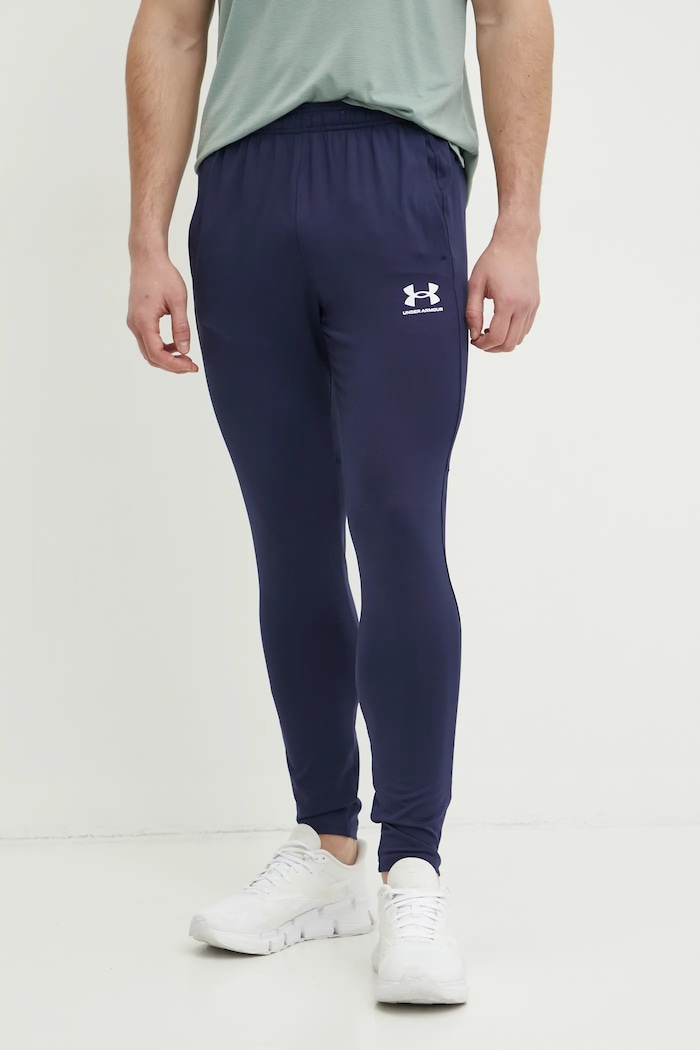 Tréningové nohavice Under Armour Challenger s elastanom tmavomodrá 1379587