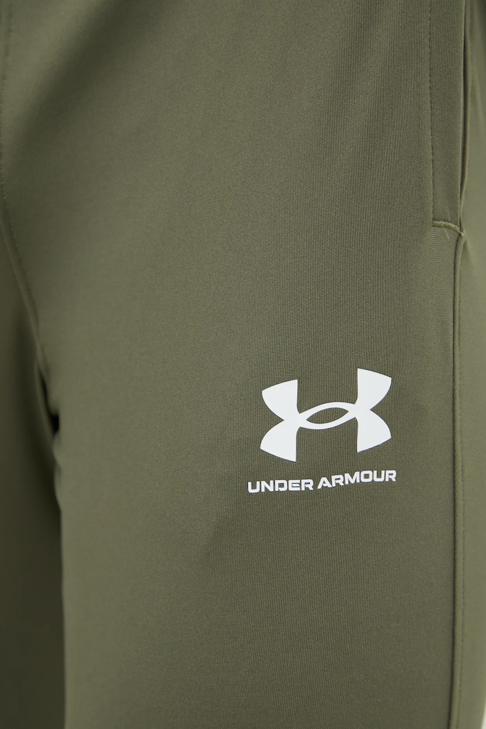 Oblečenie Tréningové nohavice Under Armour Challenger 1379587 zelená