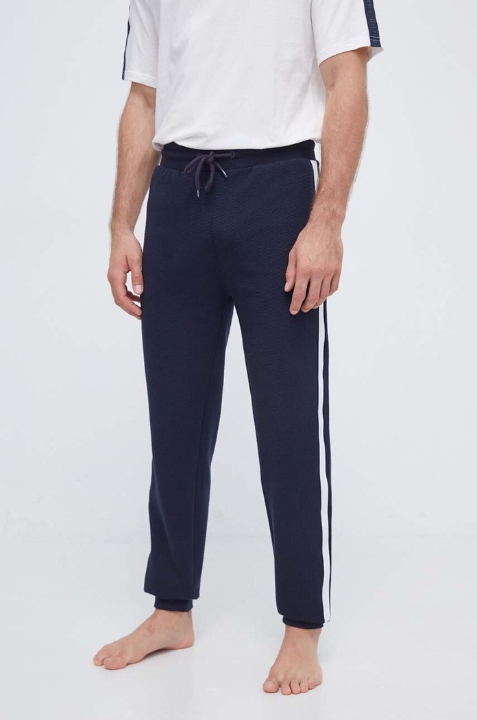 Bavlnené tepláky Tommy Hilfiger bavlna tmavomodrá UM0UM03013