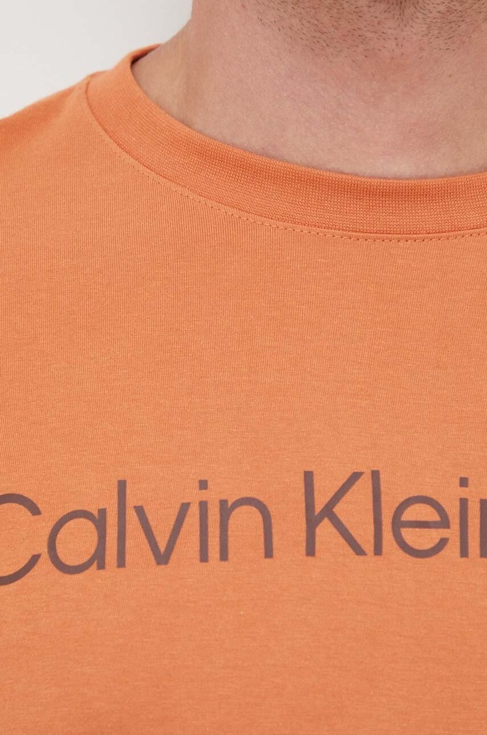 Bavlněné tričko Calvin Klein Jeans J30J322344 oranžová