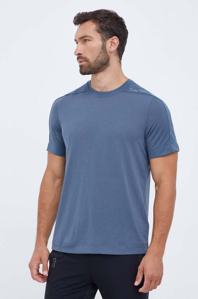 Calvin Klein Performance t-shirt treningowy z elastanem niebieski 00GMF3K134