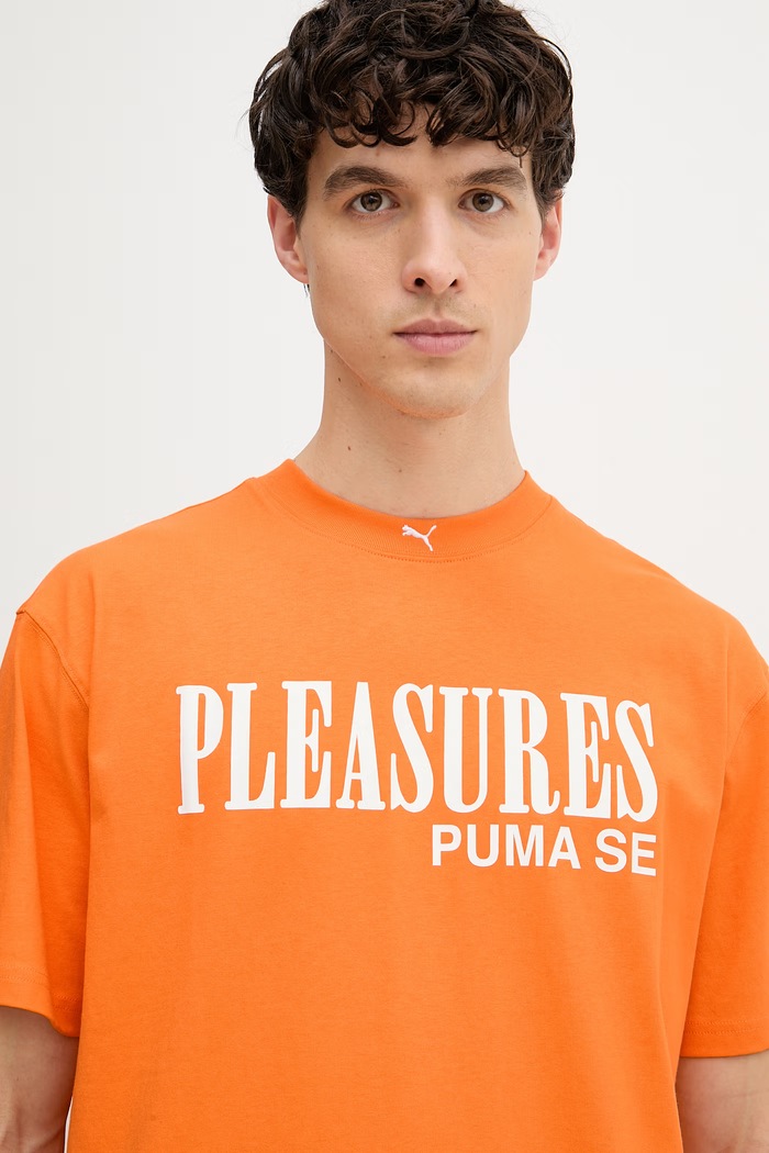 Puma tričko pánské bavlněné PUMA x PLEASURES Typo Tee oranžová 620878