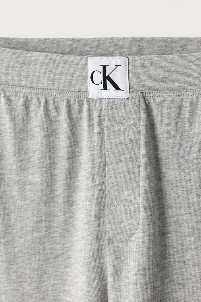 Piżama bawełniana dziecięca Calvin Klein Underwear B70B700500.9BYH szary