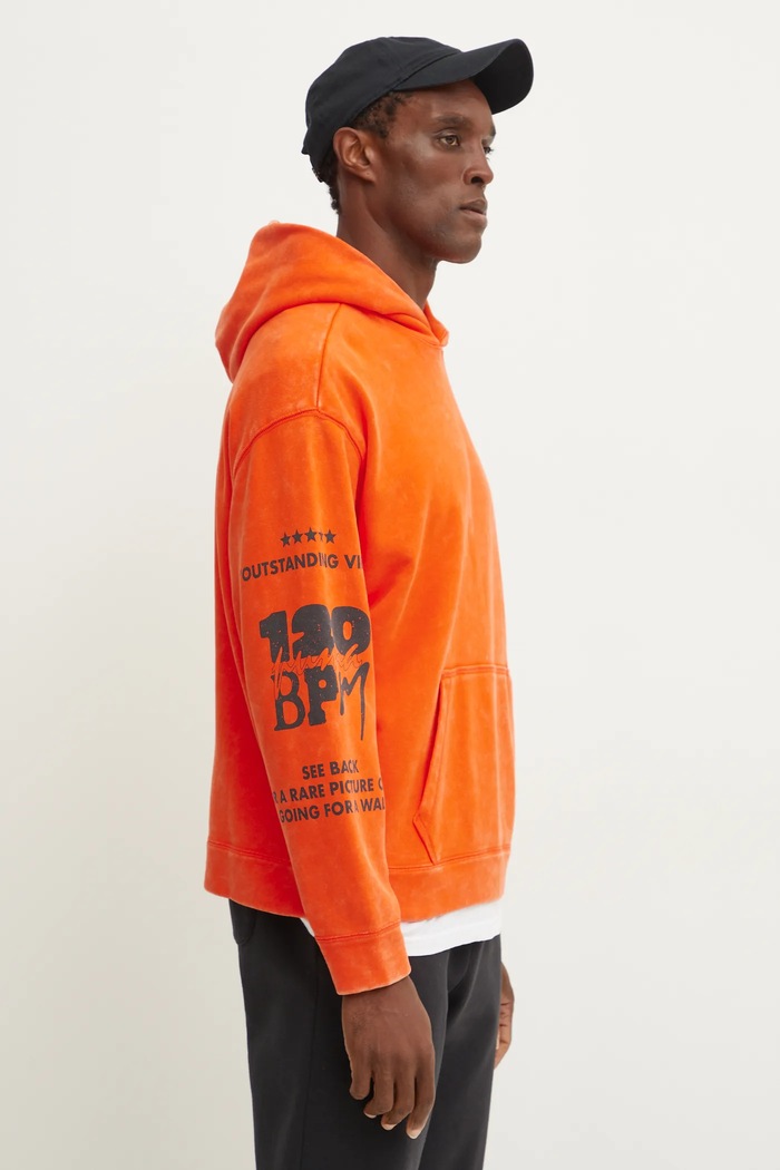 Бавовняна кофта Puma UNTERGRUND з капюшоном помаранчевий 626664