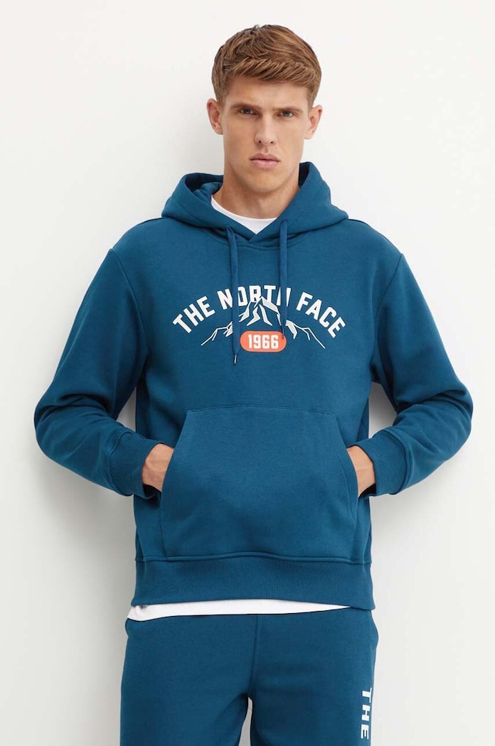 Mikina The North Face Hoodie Varsity Graphic s kapucňou tyrkysová NF0A89DJ1NO1