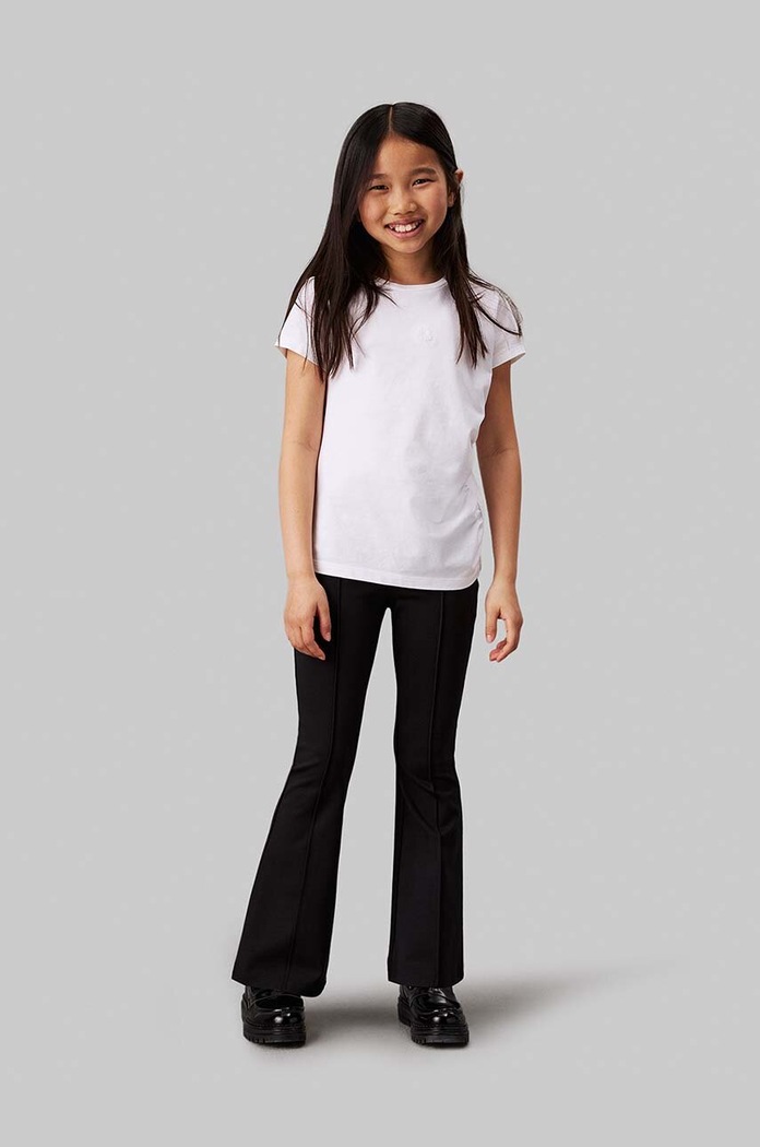 Calvin Klein Jeans legginsy dziecięce PUNTO TAPE FLARE z elastanem czarny IG0IG02518.9BYH.104.116