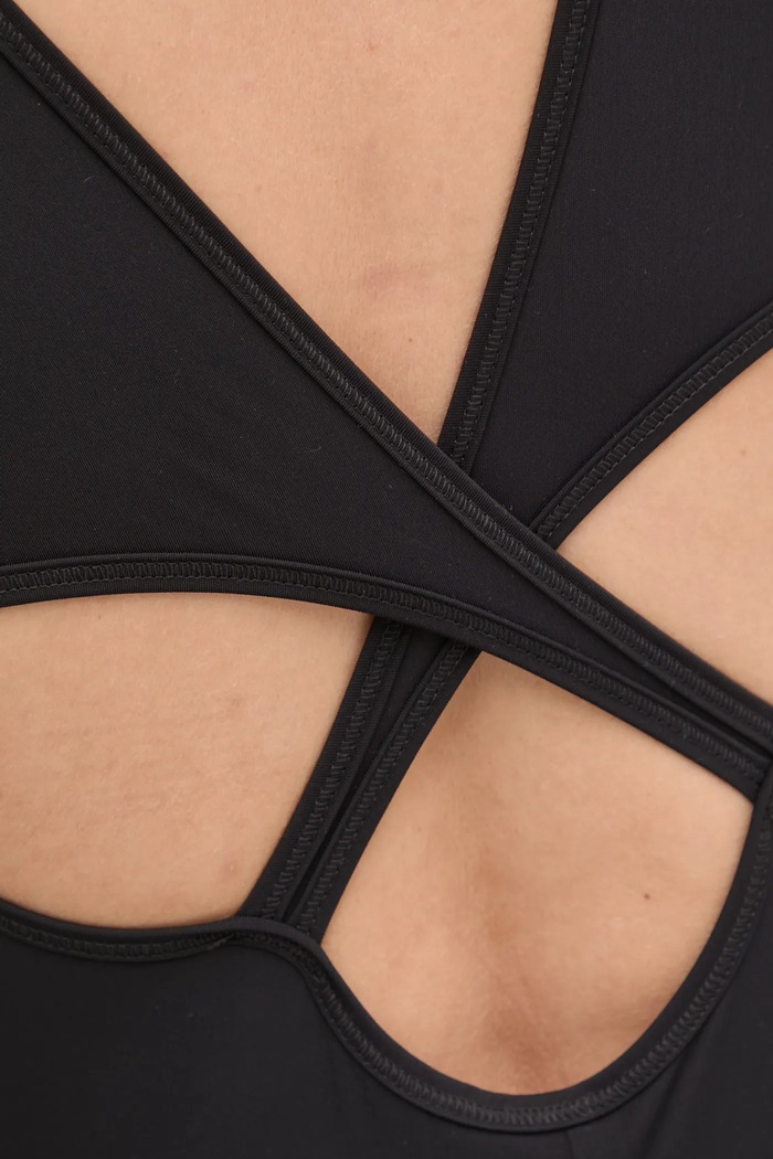 Casall kezeslábas jógázáshoz Catsuit 22258 fekete