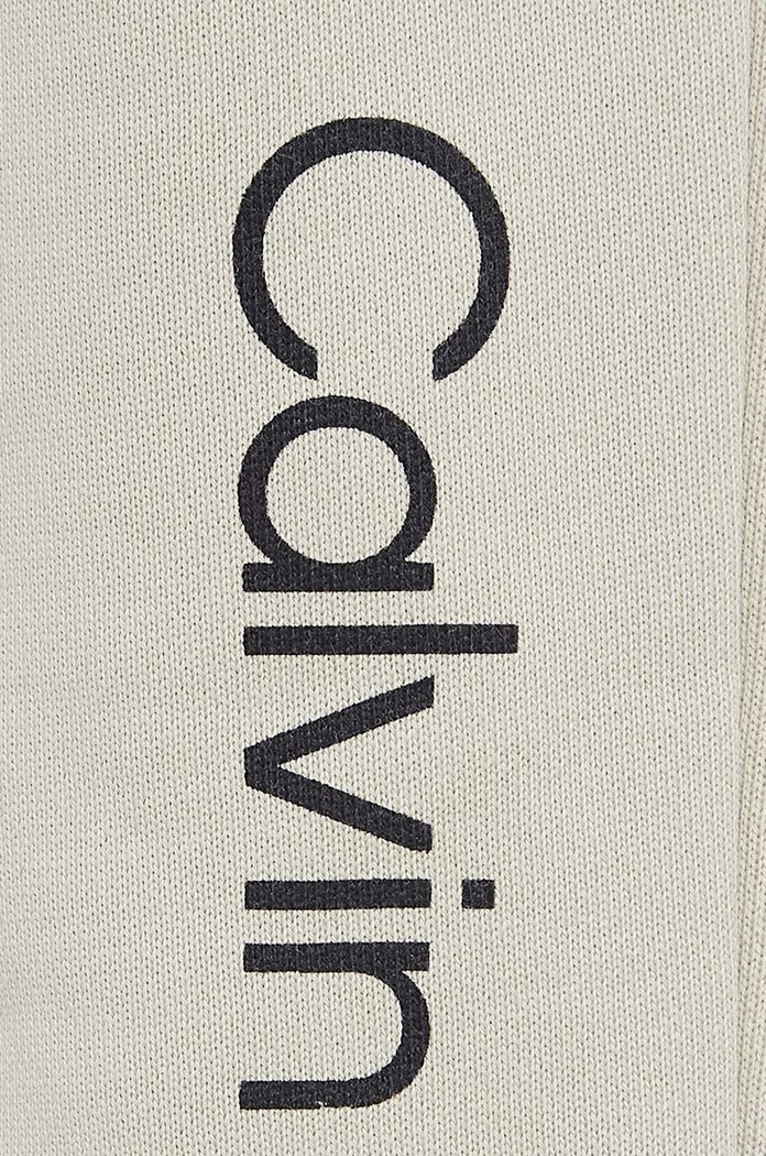 Calvin Klein Jeans spodnie dresowe bawełniane dziecięce REGULAR JOGGER beżowy IU0IU00681.128.176.9BYH