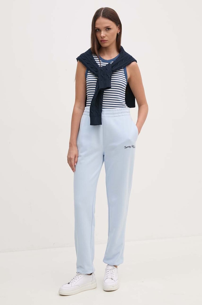 Bavlněné tepláky Tommy Hilfiger WW0WW42718 modrá AW24