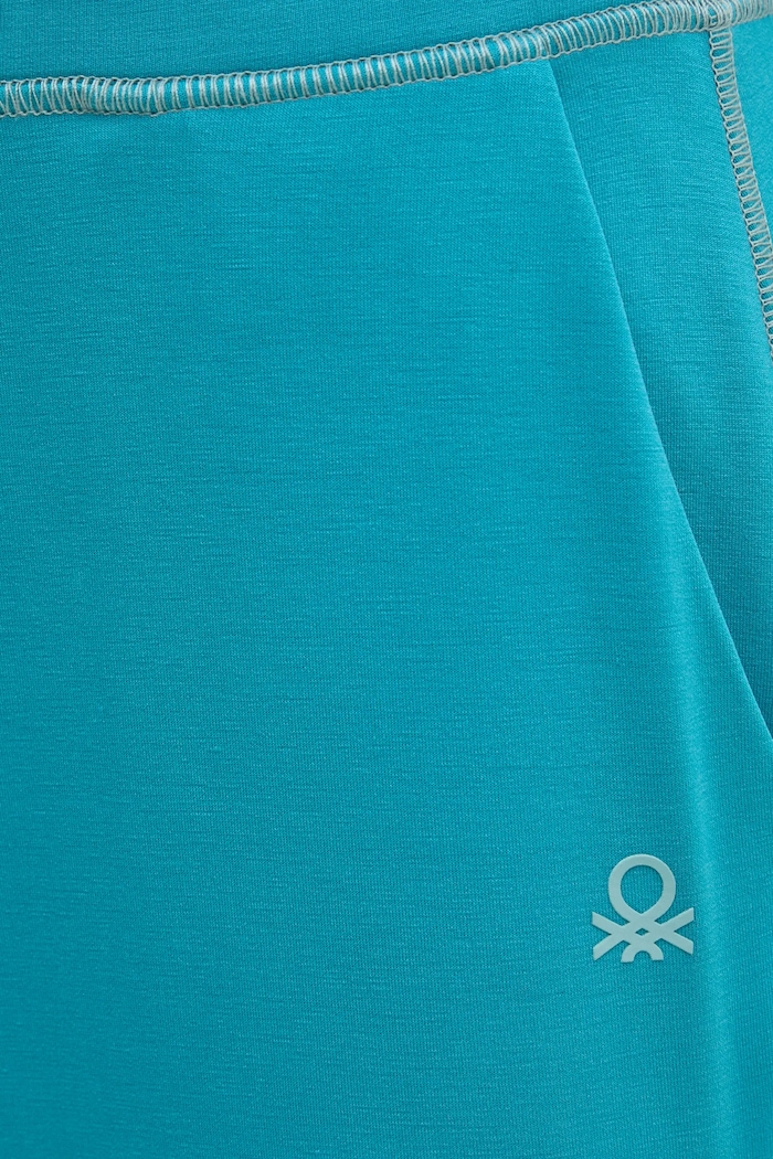 Odjeća Donji dio trenirke United Colors of Benetton 3JLC3F03T tirkizna