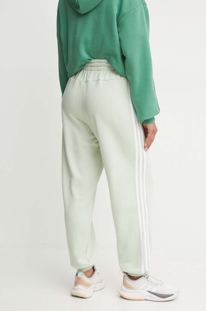 Odzież adidas spodnie dresowe bawełniane Essentials IY4236 zielony