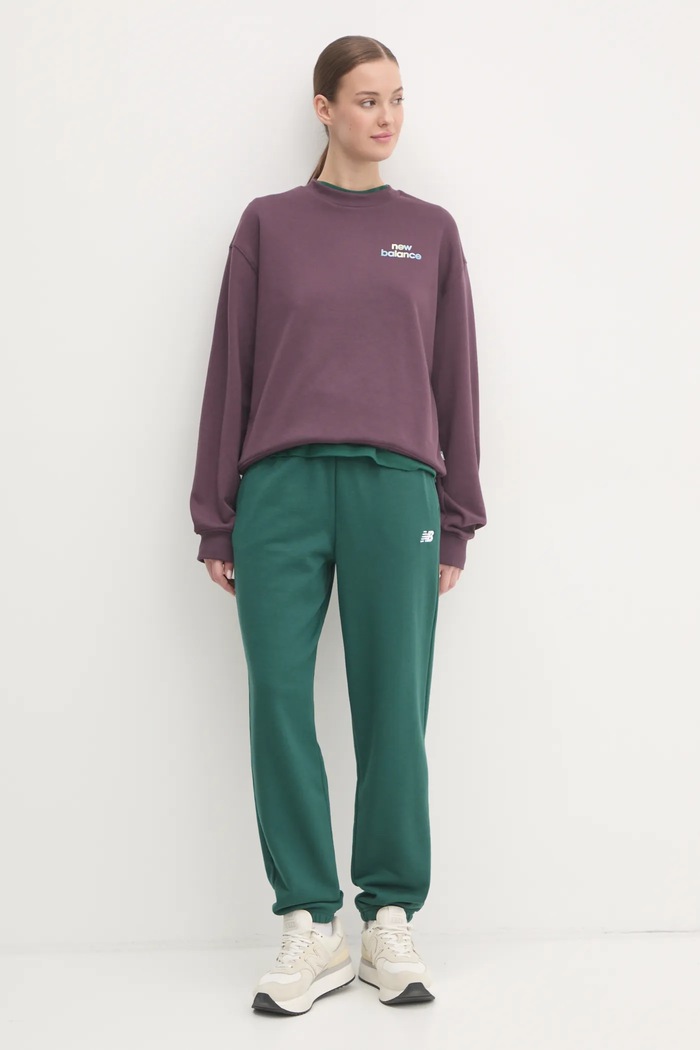 Tepláky New Balance WP41500NWG zelená AW24
