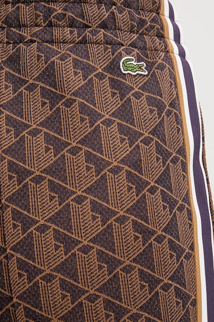Lacoste παντελόνι καμπάνα Γυναικεία καφέ XF9313