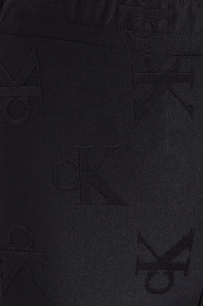 Dětské kalhoty Calvin Klein Jeans JACQUARD FLARE černá IG0IG02689.9BYH.128.176