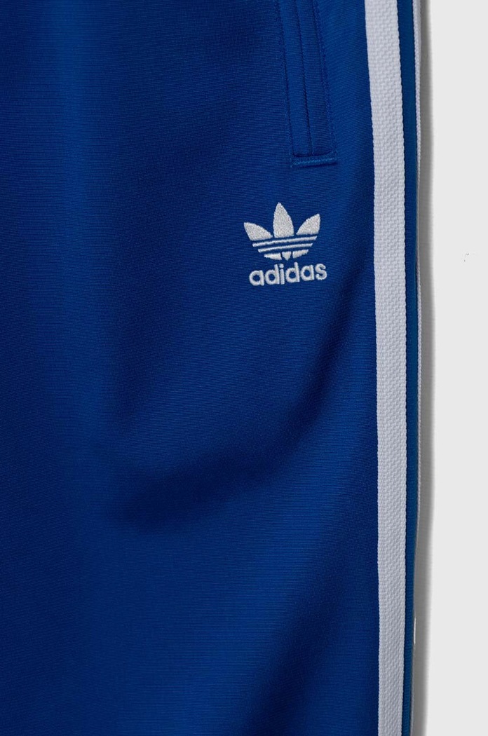 Dětské tepláky adidas Originals FIREBIRD PANTS modrá IY9803