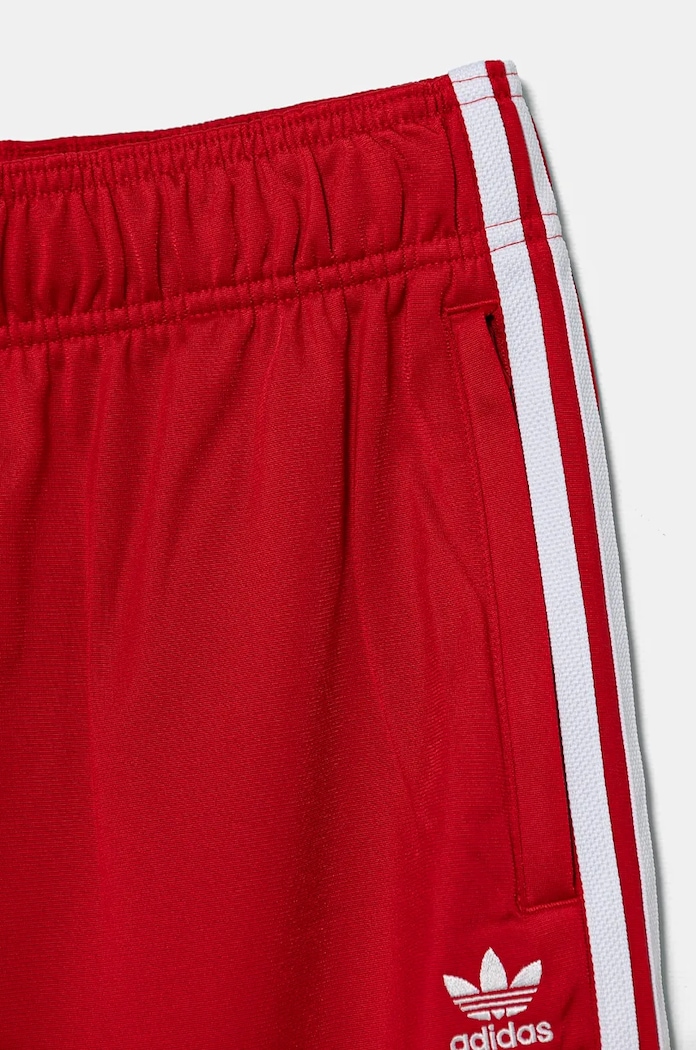 adidas Originals spodnie dresowe dziecięce SST TRACK PANTS czerwony IX7631