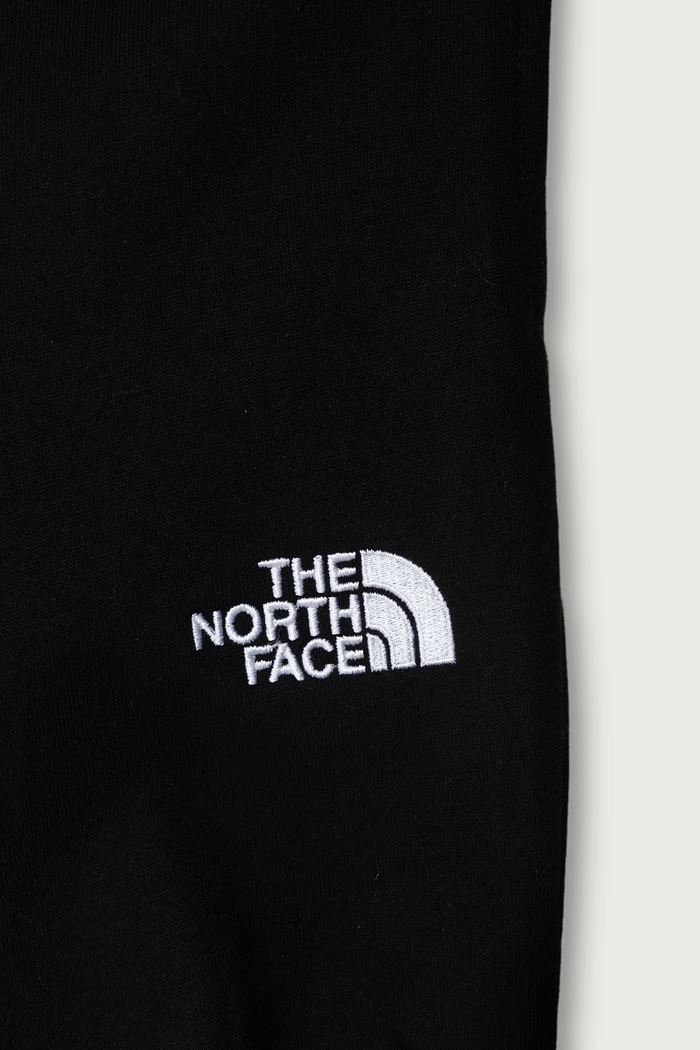Chlapec The North Face Detské bavlnené tepláky The North Face SLIM FIT JOGGERS NF0A89PDJK31 čierna