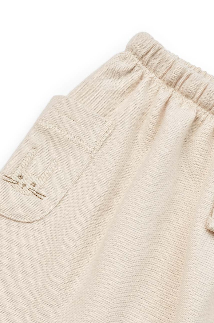 Pamučni donji dio trenirke za bebe Liewood Alain Baby Pants bež LW19157