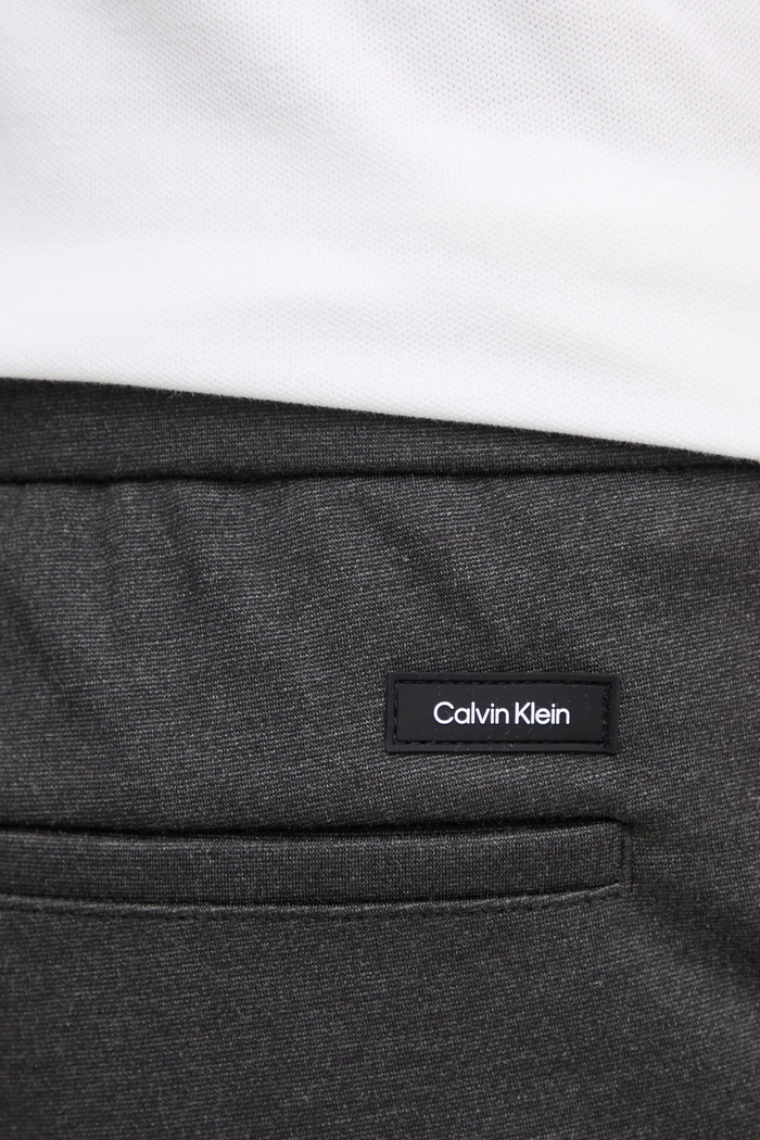 Kalhoty Calvin Klein šedá K10K113648