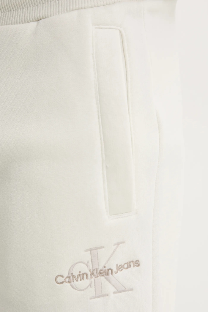 Tepláky Calvin Klein Jeans béžová J30J325658