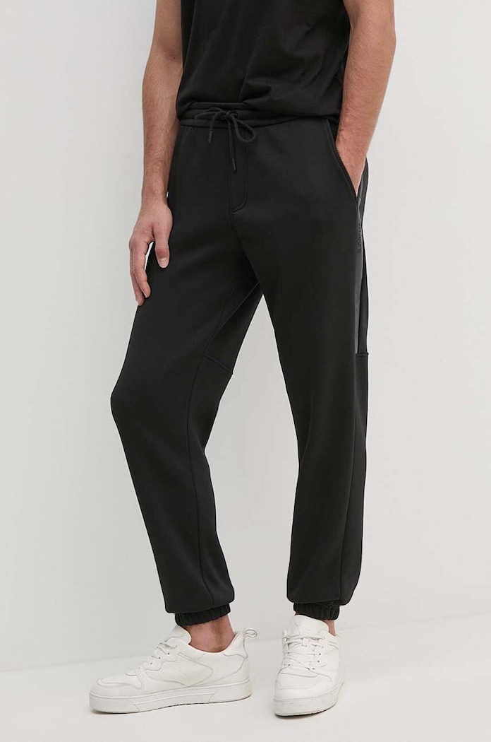 Παντελόνι φόρμας Calvin Klein Jeans πλεκτό ύφασμα μαύρο J30J325659