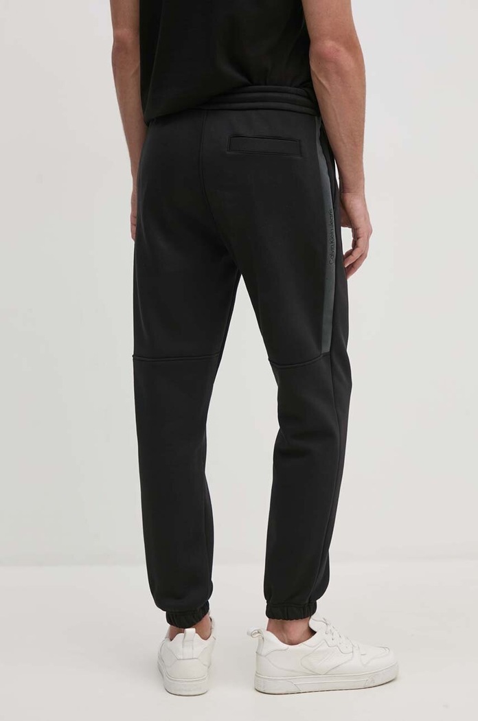 Ρούχα Παντελόνι φόρμας Calvin Klein Jeans J30J325659 μαύρο