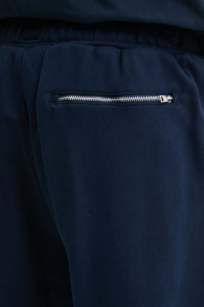 Tommy Jeans spodnie dresowe granatowy DM0DM19480