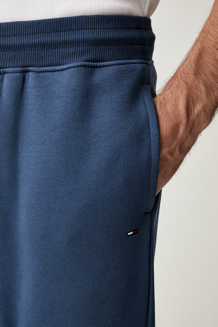 Tommy Jeans spodnie dresowe męskie z bawełną granatowy DM0DM20473