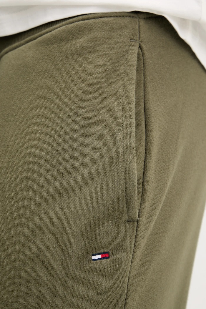 Tepláky Tommy Jeans zelená DM0DM20473