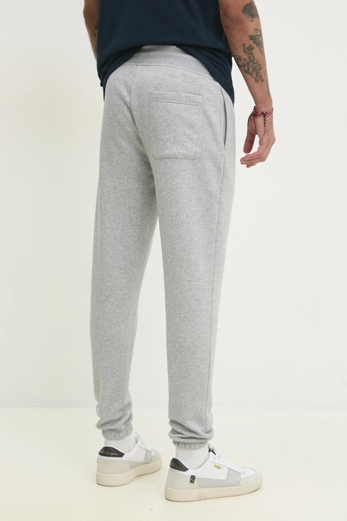 Ρούχα Παντελόνι φόρμας Tommy Jeans DM0DM20473 γκρί