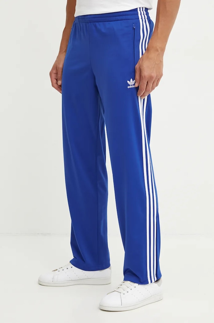 Tepláky adidas Originals Firebird pletenina modrá IZ3072