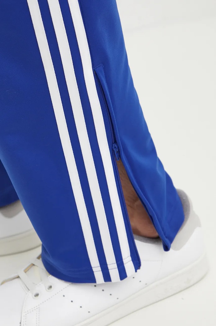 Tepláky adidas Originals Firebird modrá IZ3072