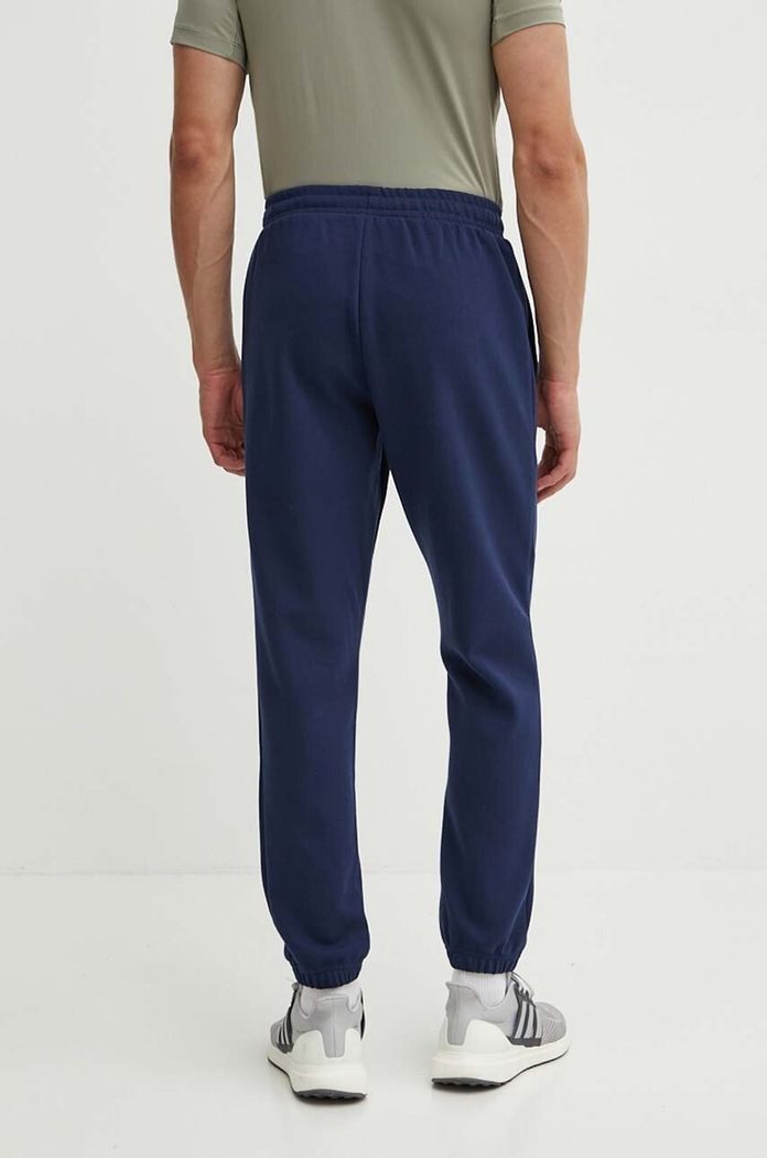 Odzież adidas Performance spodnie dresowe Polska JF6683 granatowy