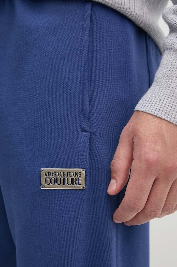 Bavlněné tepláky Versace Jeans Couture modrá 77GAAT08.CF00T