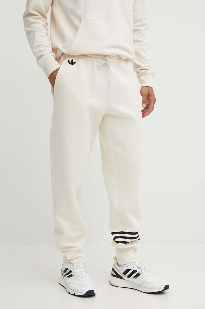 adidas Originals melegítőnadrág aplikációval bézs JF9153