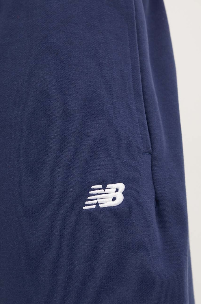 Tepláky New Balance tmavomodrá MP41519NNY