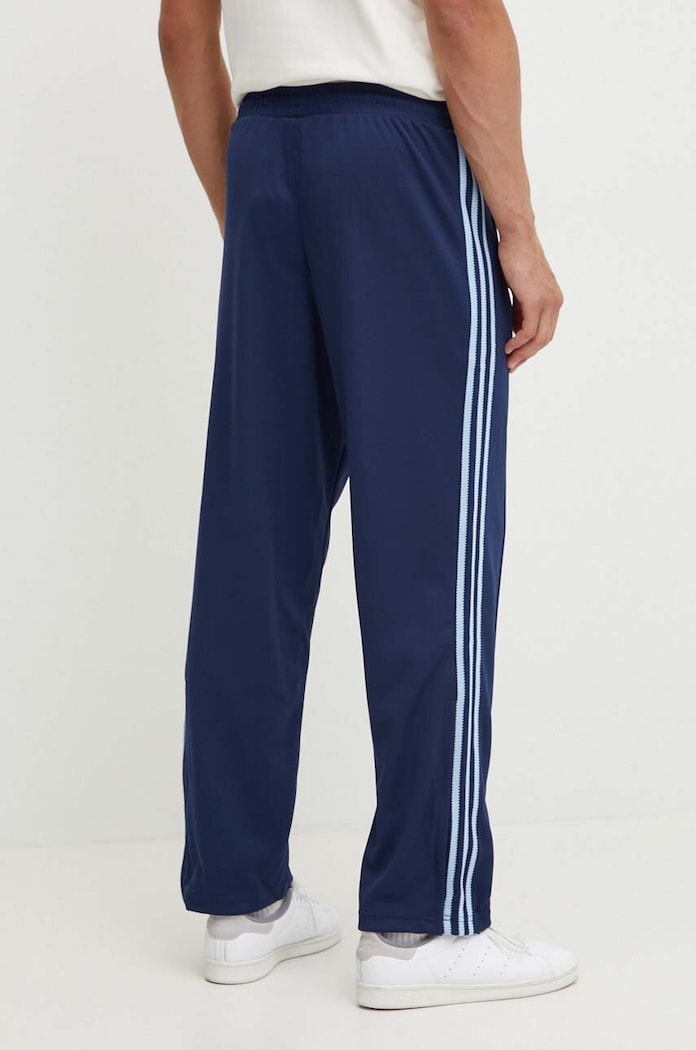 Oblečenie Tepláky adidas Originals IW3231 tmavomodrá