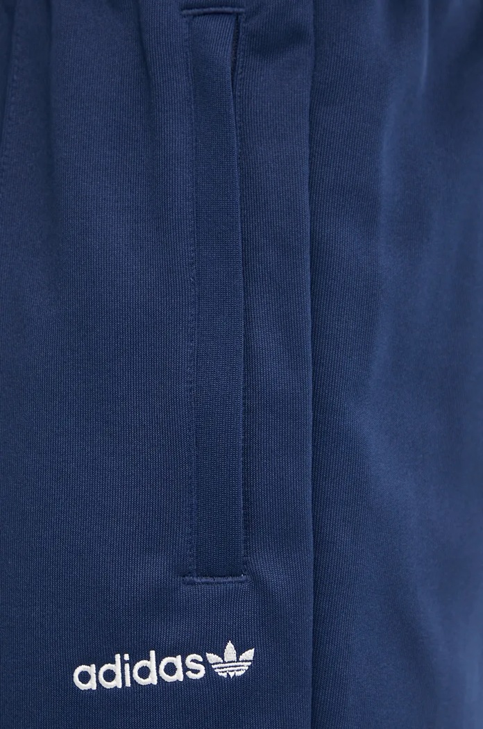 Tepláky adidas Originals tmavomodrá IW3232