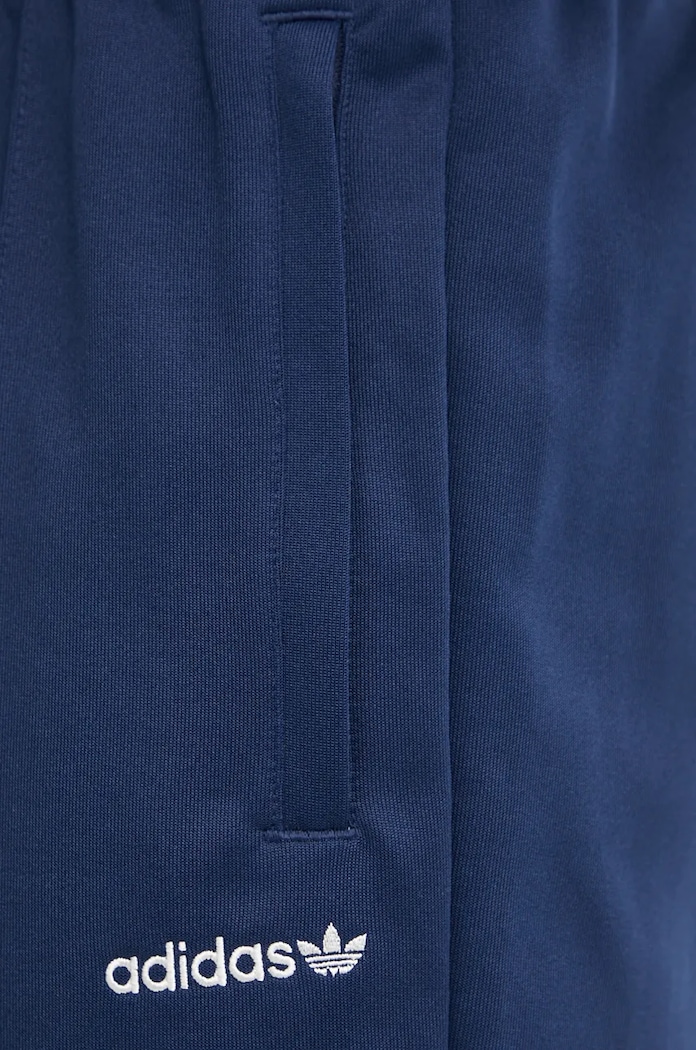 Tepláky adidas Originals tmavomodrá IW3232