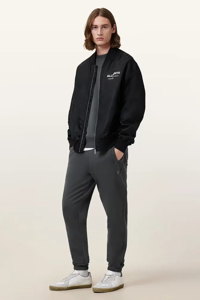 Oblečenie AllSaints teplákové nohavice pánske bavlnené RAVEN SWEATPANT M031TA sivá