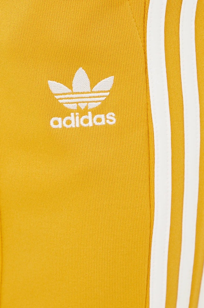 Tepláky adidas Originals 70S Track Pant žlutá IX5223