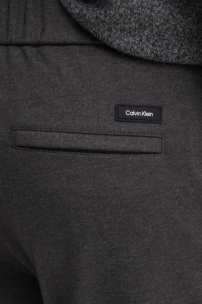 Nohavice Calvin Klein sivá K10K113647