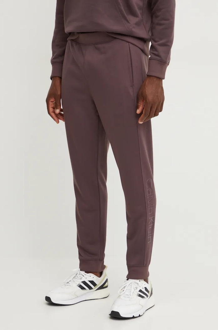 Tréninkové kalhoty Calvin Klein Performance pletenina hnědá 00GMF4P602