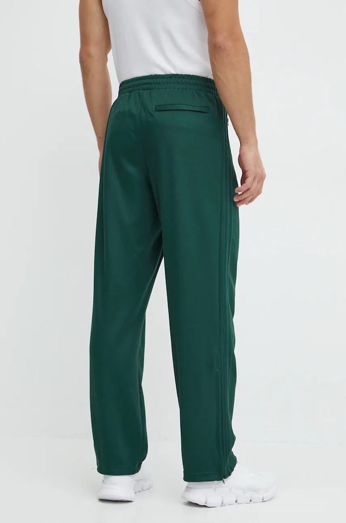 Oblečení Tepláky adidas Originals IW3251 zelená
