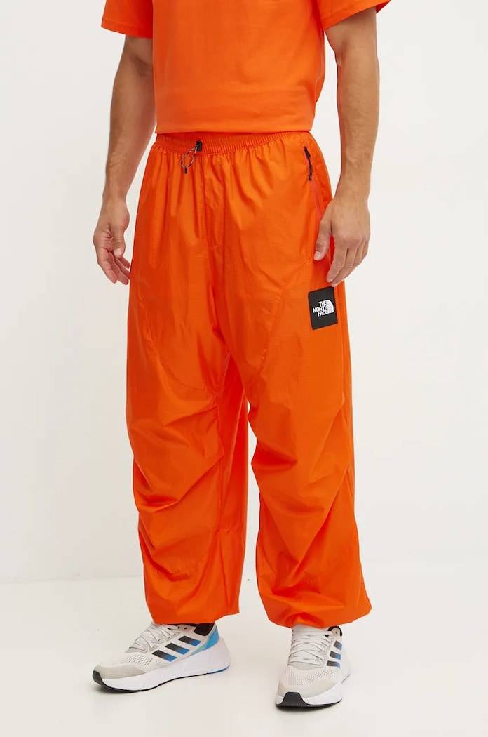 The North Face Kalhoty The North Face TNF x Yinka Ilori oranžová NF0A89GPA6M1